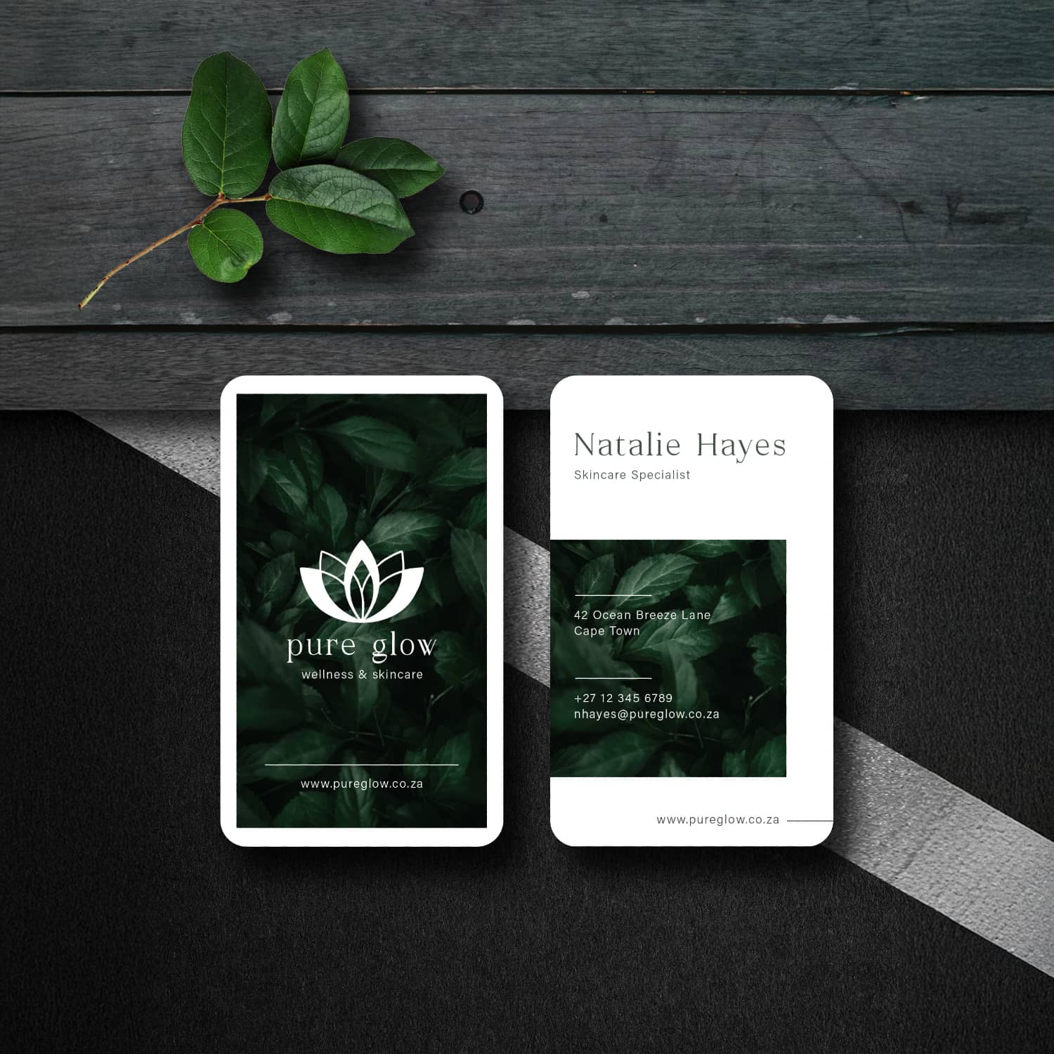 Green business card design by DesignB Creative Studio for Pure Glow, featuring leaf background and lotus logo